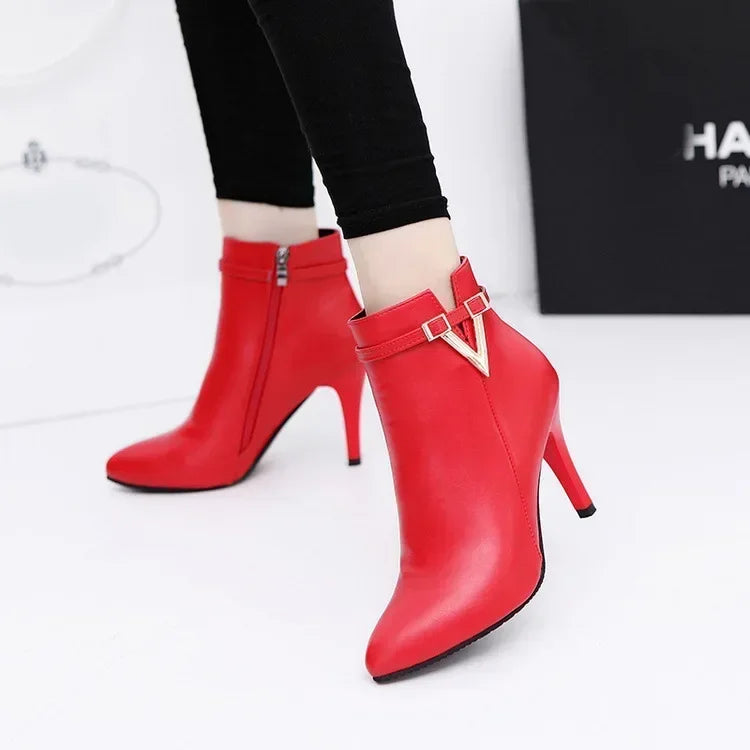 V-Embellished Patent Leather Ankle Boots