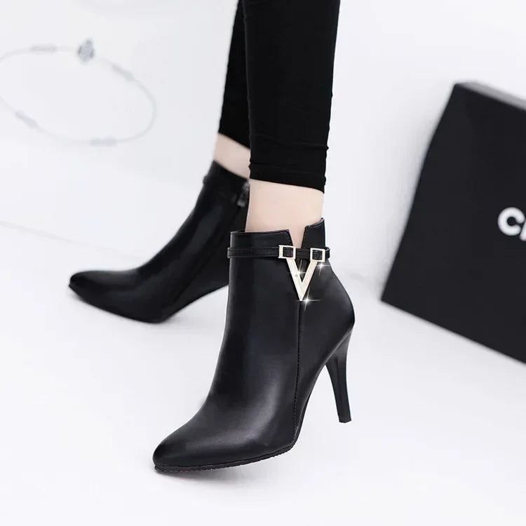 V-Embellished Patent Leather Ankle Boots